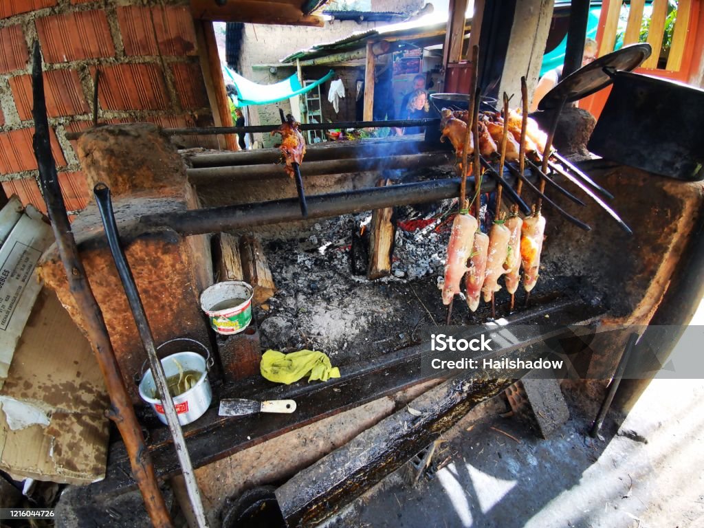 Spit Roasted Guinea Pigs Stock Photo Download Image Now Abstract