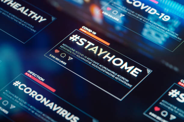 istock #stayhome. Stay home hashtag close-up on digital display 1216045634
