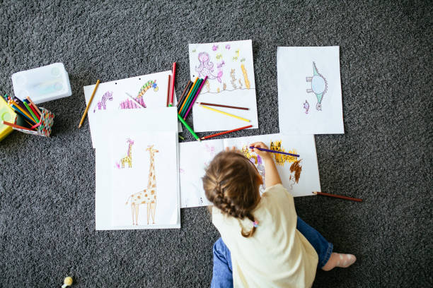 istock Young dad have fun drawing with little daughter 1216045904