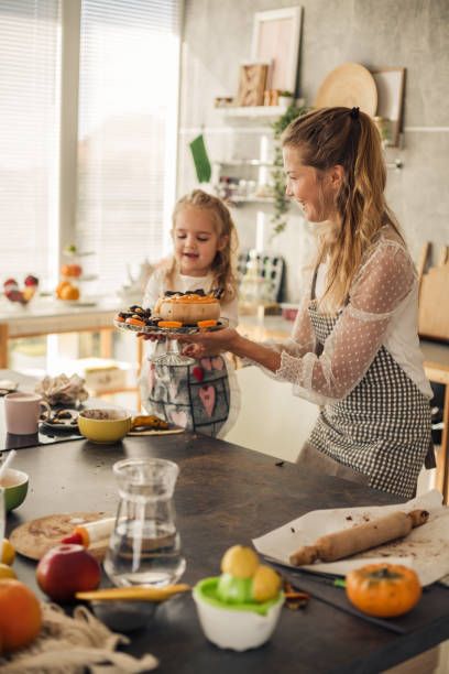 istock Two generations holding proudly healthy vegan preparation 1216048324
