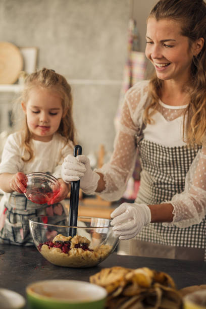 istock Working together while smashing ingredients for vegan dessert 1216048336