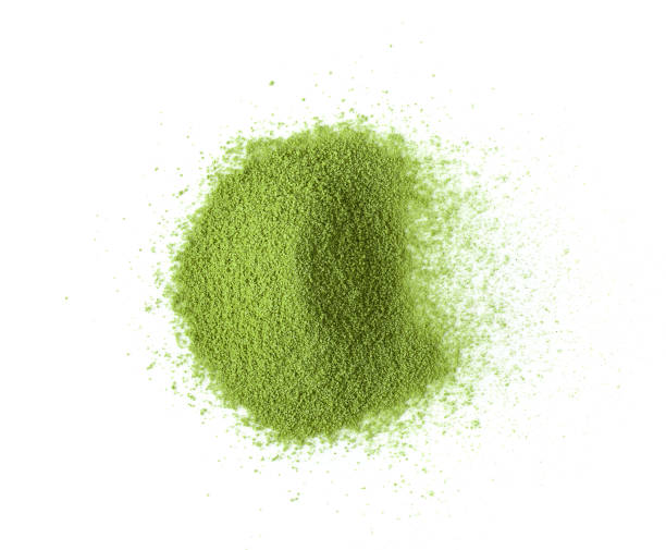 istock Green tea powder on white background 1216052951