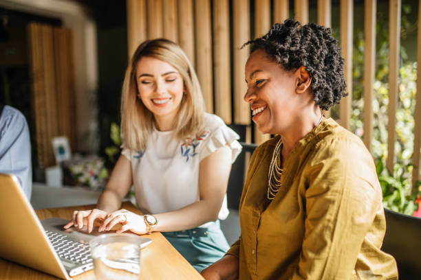 istock Two Female Entrepreneurs Using Laptop, Working on New Project 1216053048