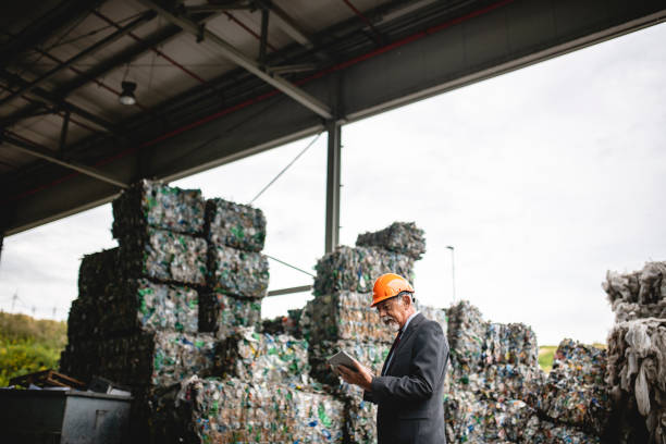istock Senior Waste Management Consultant Using Digital Tablet 1216056218