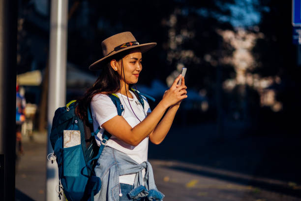 istock Curious girl taking a photo 1216056303
