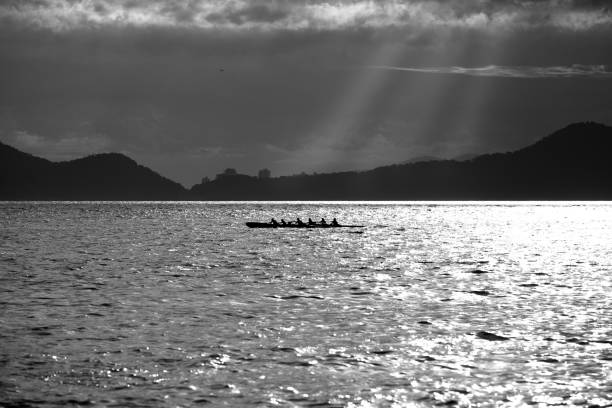 istock Six paddlers in a Hawaiian canoe 1216059911