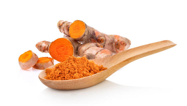 istock Turmeric powder in wood spoon isolated on white background 1216063132