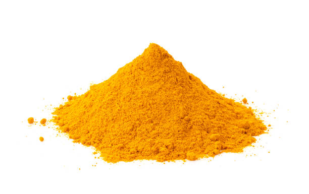 istock turmeric powder Isolated on white background 1216063141