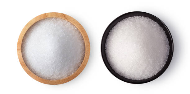 istock white sugar in bowl isolated on white background 1216064296