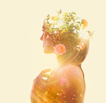 Multiple exposure of a Young woman feeling gratitude for nature and good health