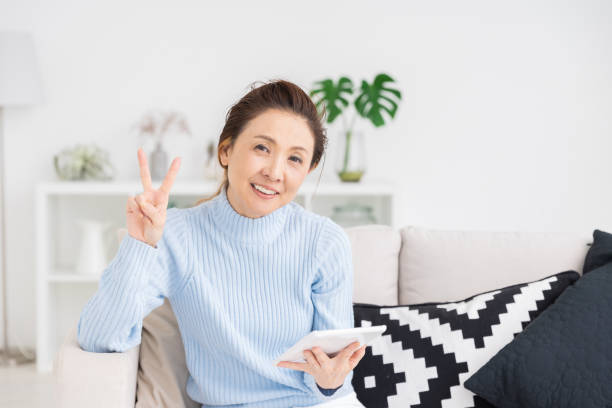 istock senior age woman who uses tablet computer 1216066093