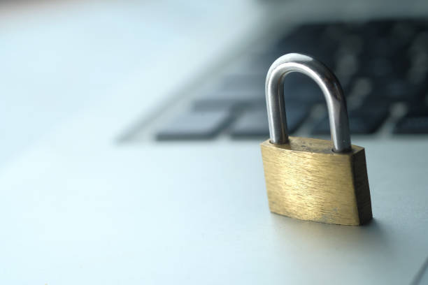 istock Cyber safety concept, locked and key on laptop computer keyboard 1216073828