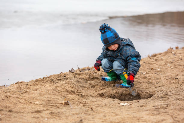 300+ Boy Digging Hole Stock Photos, Pictures & Royalty-Free Images - iStock
