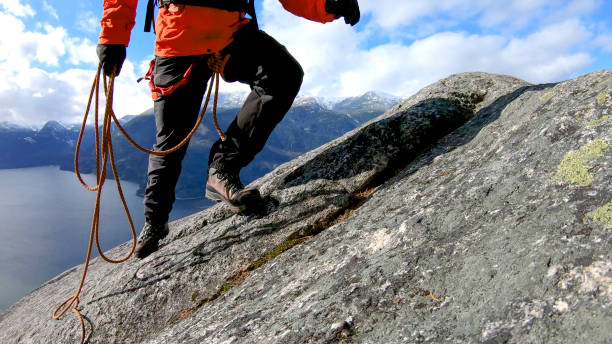 istock Mountaineer walks along mountain ridge 1216076693