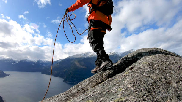 istock Mountaineer walks along mountain ridge 1216076695