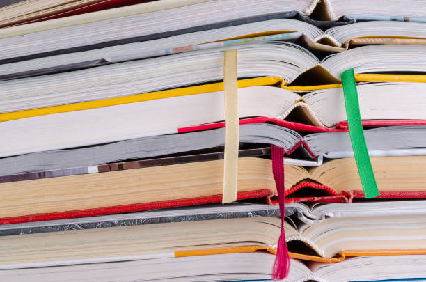 istock Closeup background of a stack of books. 1216076696