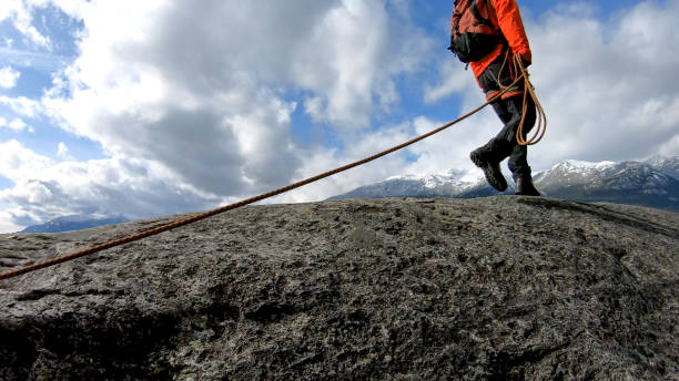 istock Mountaineer walks along mountain ridge 1216076848