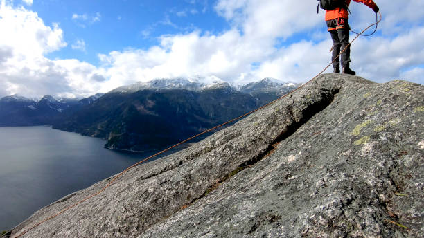 istock Mountaineer walks along mountain ridge 1216079010