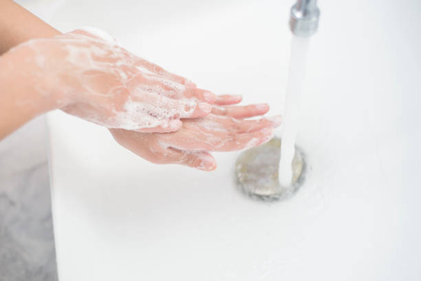 istock A woman is washing hands 1216085096