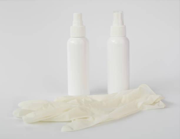 istock Coronavirus prevention with gloves,hand sanitizer alcohol spray on white background 1216086768