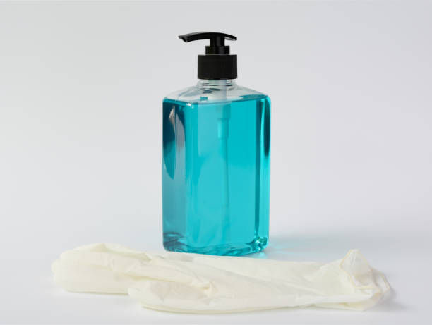 istock Coronavirus prevention with gloves,hand sanitizer alcohol spray on white background 1216086811