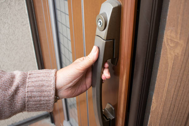 istock Elderly woman having a front door. 1216087116