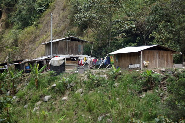Wooden farm house on the side of a mountain outside Santa Rosa, in the Intag Valley, Ecuador