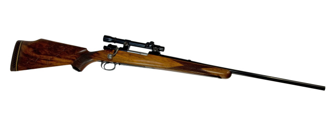 A .270 caliber Husquavarna rifle with engraved stock, small \