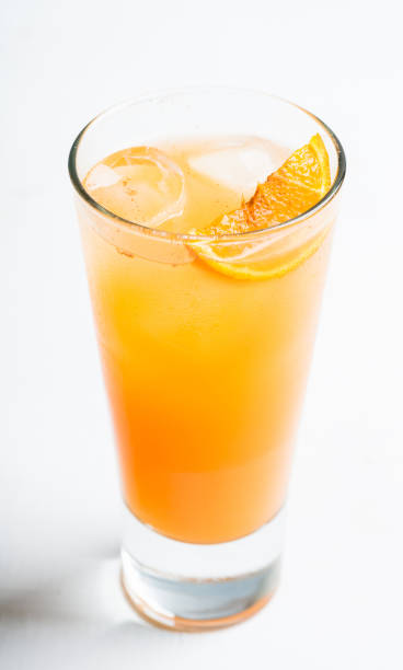 istock Fresh cocktail with vodka and orange juice on the rustic background 1216091396