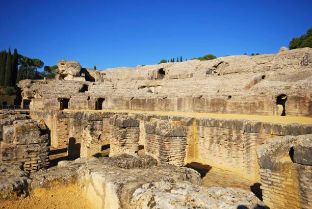 Arena in the Amphitheatre at the Romans ruins of Italica, Seville, Spain. Arena in the Amphitheatre at the Romans ruins of Italica, Seville, Seville Province, Andalusia, Spain, Europe. italica spain stock pictures, royalty-free photos & images