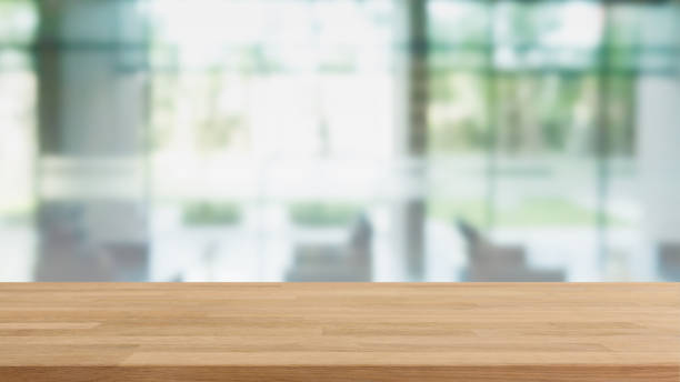 istock Empty wood table top and blurred coffee shop and restaurant interior background - can used for display or montage your products. 1216093347