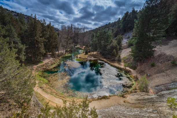 istock small lake fuentona diving spain 1216096337