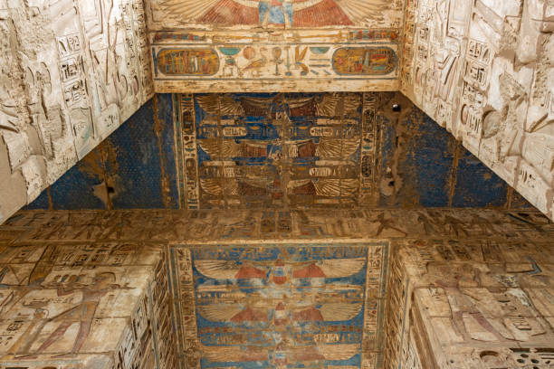 Ceiling decoration using colored minerals in the peristyle hall of the Mortuary Temple of Ramesses III Ceiling decoration using colored minerals in the peristyle hall of the Mortuary Temple of Ramesses III rameses ii stock pictures, royalty-free photos & images