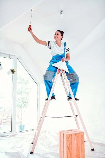 istock Female Enjoying Painting Room Activity 1216099870