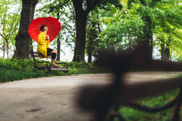 istock Sad woman on rain 1216099880
