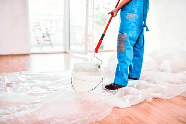 istock Female Repainting Home 1216099977