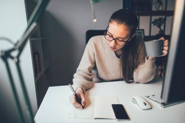 istock Young businesswoman working on computer 1216099997