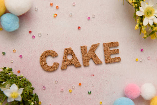 istock cake alphabet letter word text stamp 1216103852