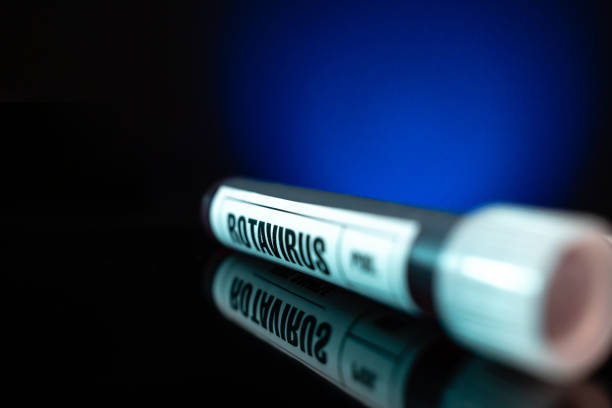 istock Rotavirus blood test sample tube close-up white label, blue background 1216104898