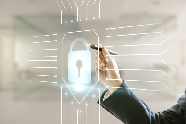 istock Man hand with pen draws virtual creative lock symbol and microcircuit illustration on blurred office background. Protection and firewall concept. Multiexposure 1216106408