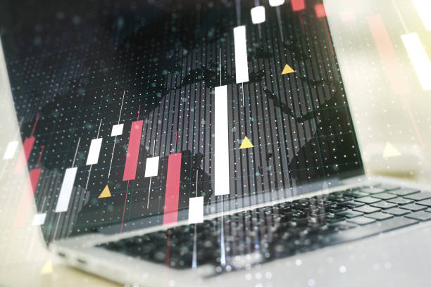 istock Multi exposure of abstract creative financial graph with world map on modern laptop background, forex and investment concept 1216106709