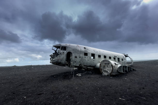 istock Plane wreckage in Black sand beach in Iceland 1216107180