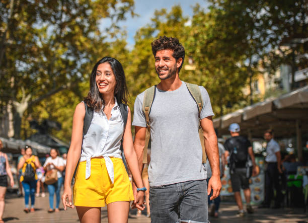 istock Smiling Couple Sightseeing on The Ramblas in Barcelona 1216113161
