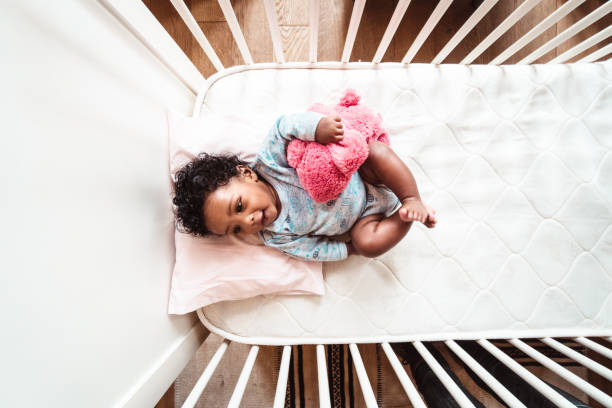 istock little girl in the crib 1216114809