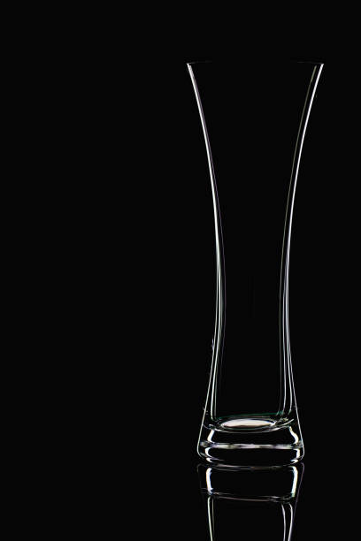 istock Glass vase, isolated on the black background. 1216116164