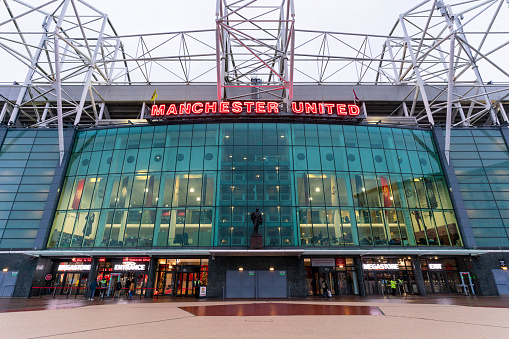 Manchester UK - December 12, 2020: View of Manchester United football club in the front stadium the Old Trafford, Home of the Red Devils.