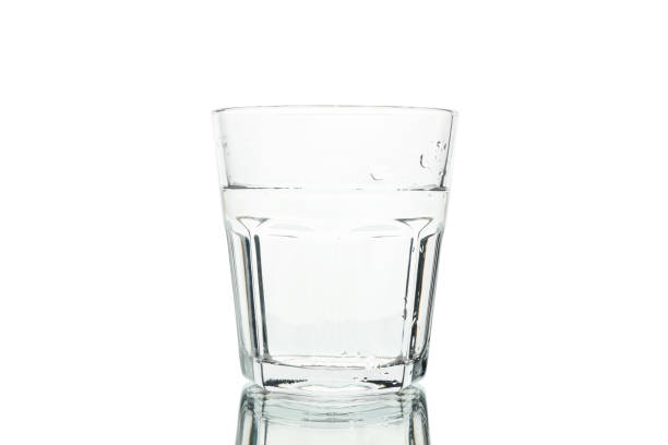 istock Glass with water isolated on white background 1216118648