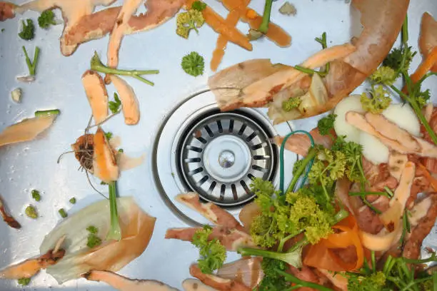 Photo of Mix of vegetables waste in home kitchen sink