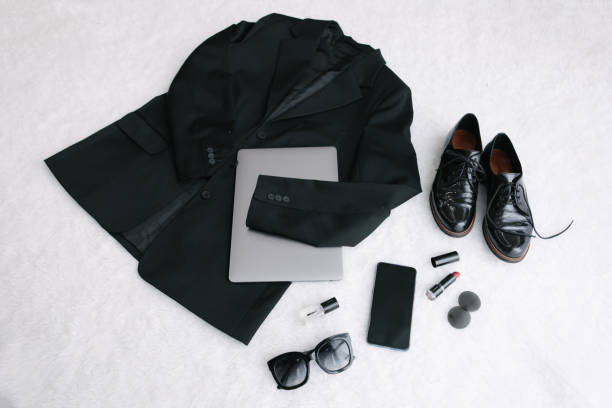 istock overhead flat lay view woman clothes black and white 1216123347