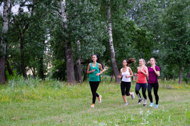 istock Women running in field 1216125066